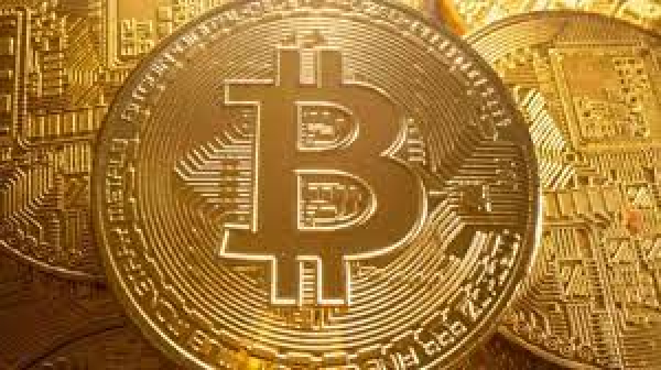 Bitcoin sube a los US$60,000, con miras alcanzar su precio histórico de US$69,000