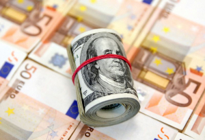 Euro almost reaches parity with the dollar